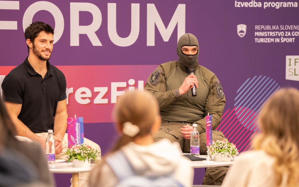 Franko Bajc and a member of the Special Unit during a round table discussion
