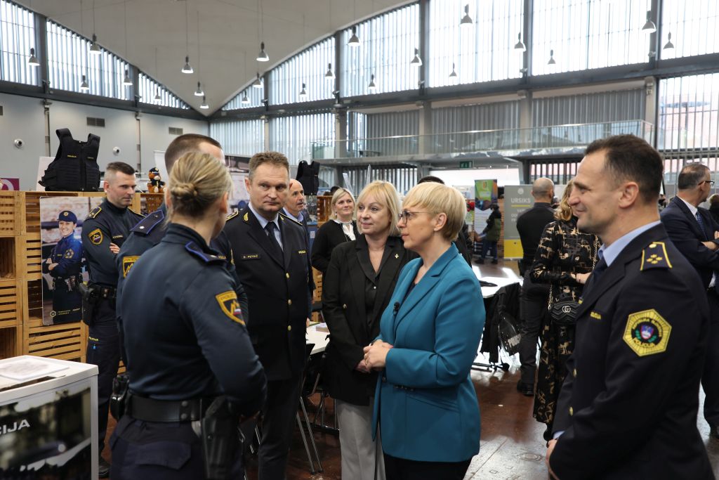 The President visited the fairgrounds and spoke with police officers.