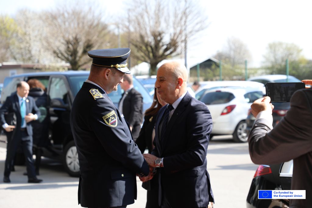Damjan Petrič and Ali Badaoui shaking hands upon Badaoui's arrival 