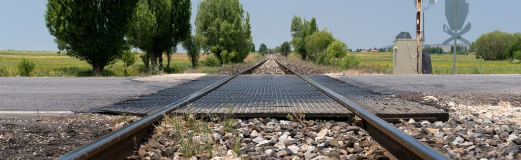 picture of level railway crossing from railway line